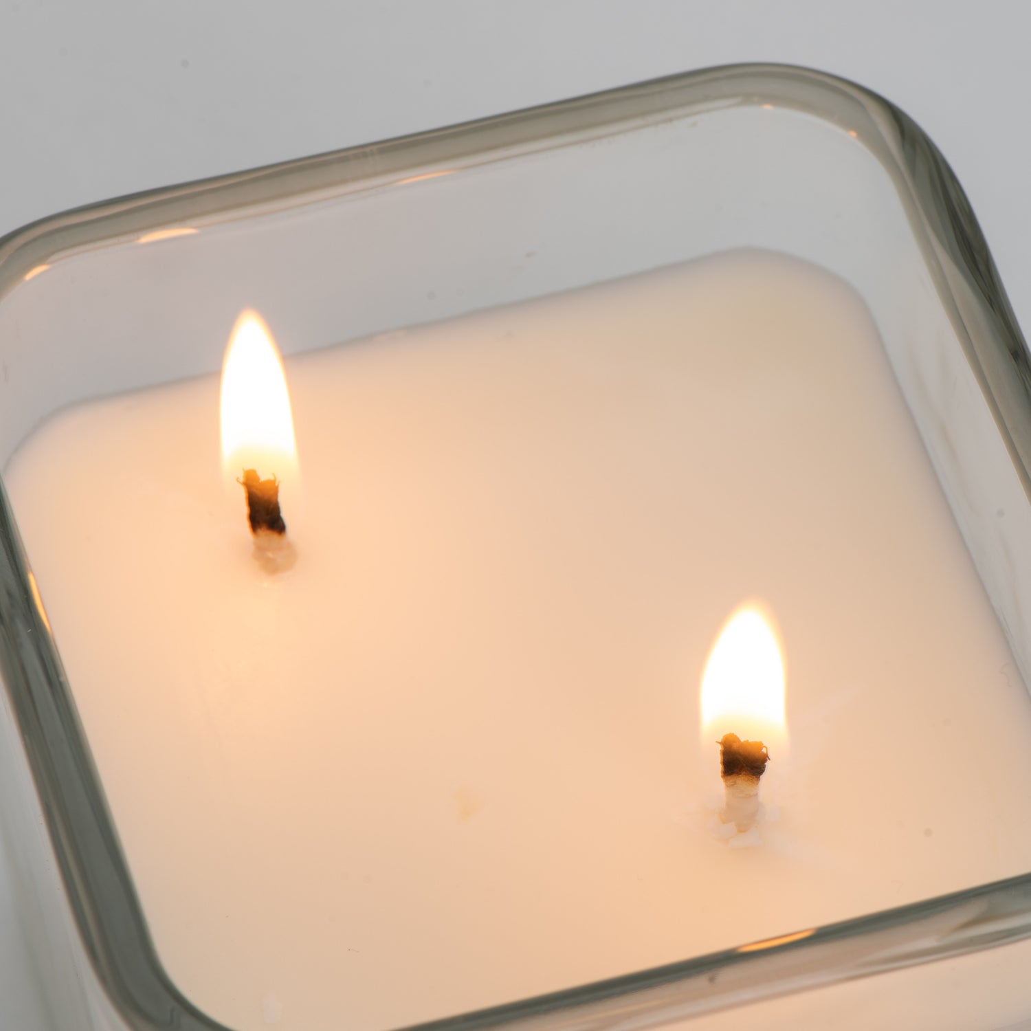 Double wick soy candle burning